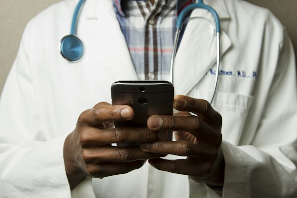 Healthcare professional with patient